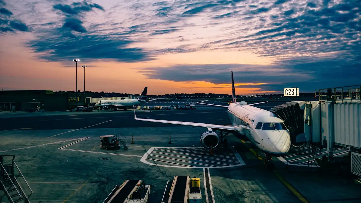 Passenger jet parked at the airport gate at dusk