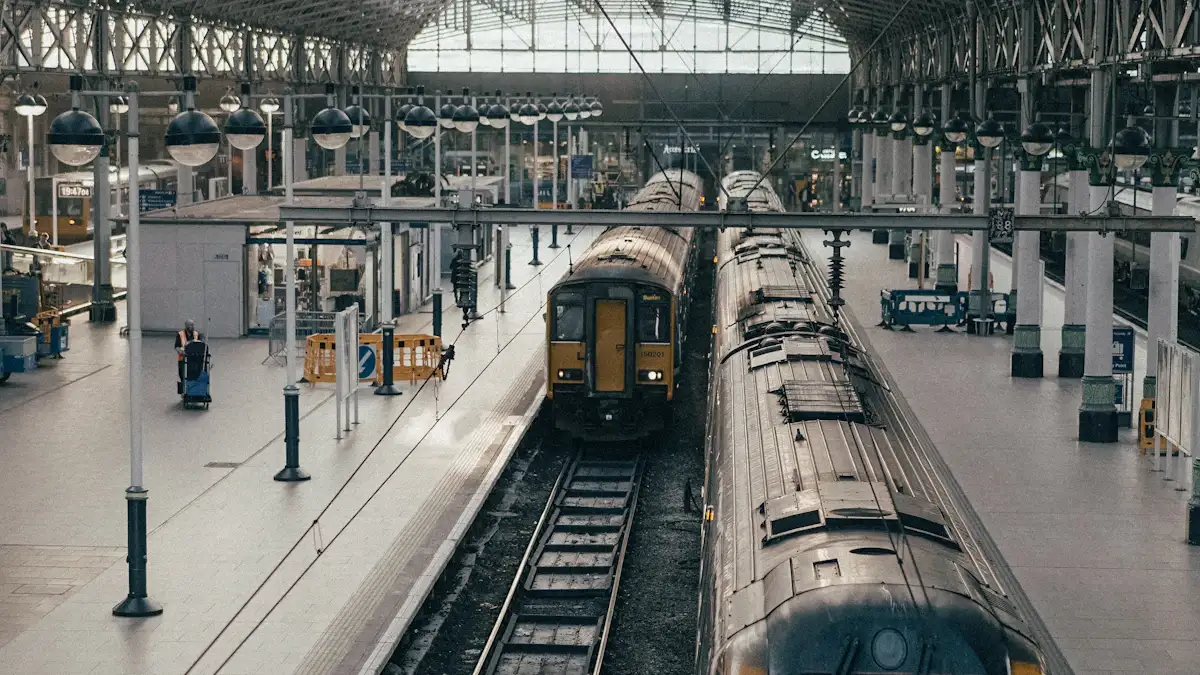 Passenger trains waiting at a large European railway station