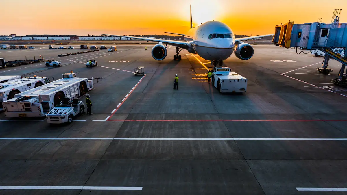 Airplane at the gate during sunset